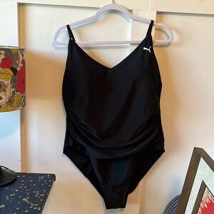 Black PUMA swimsuit with side ruching. New, never worn XXL